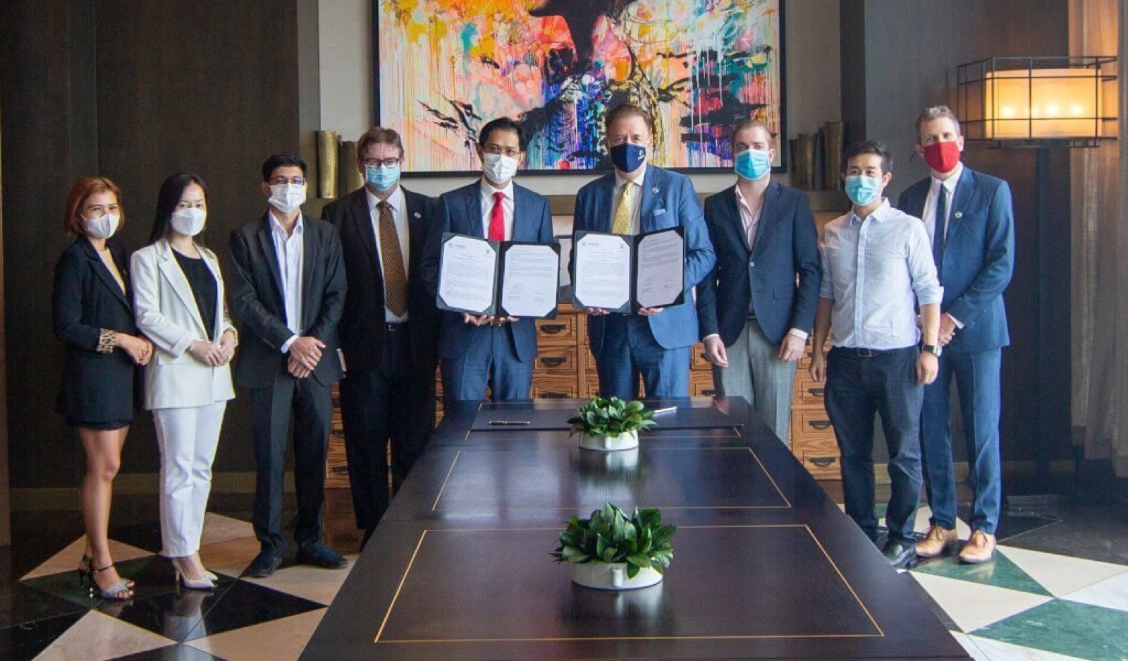 Signing the memorandum with Khmer Enterprise at Rosewood
