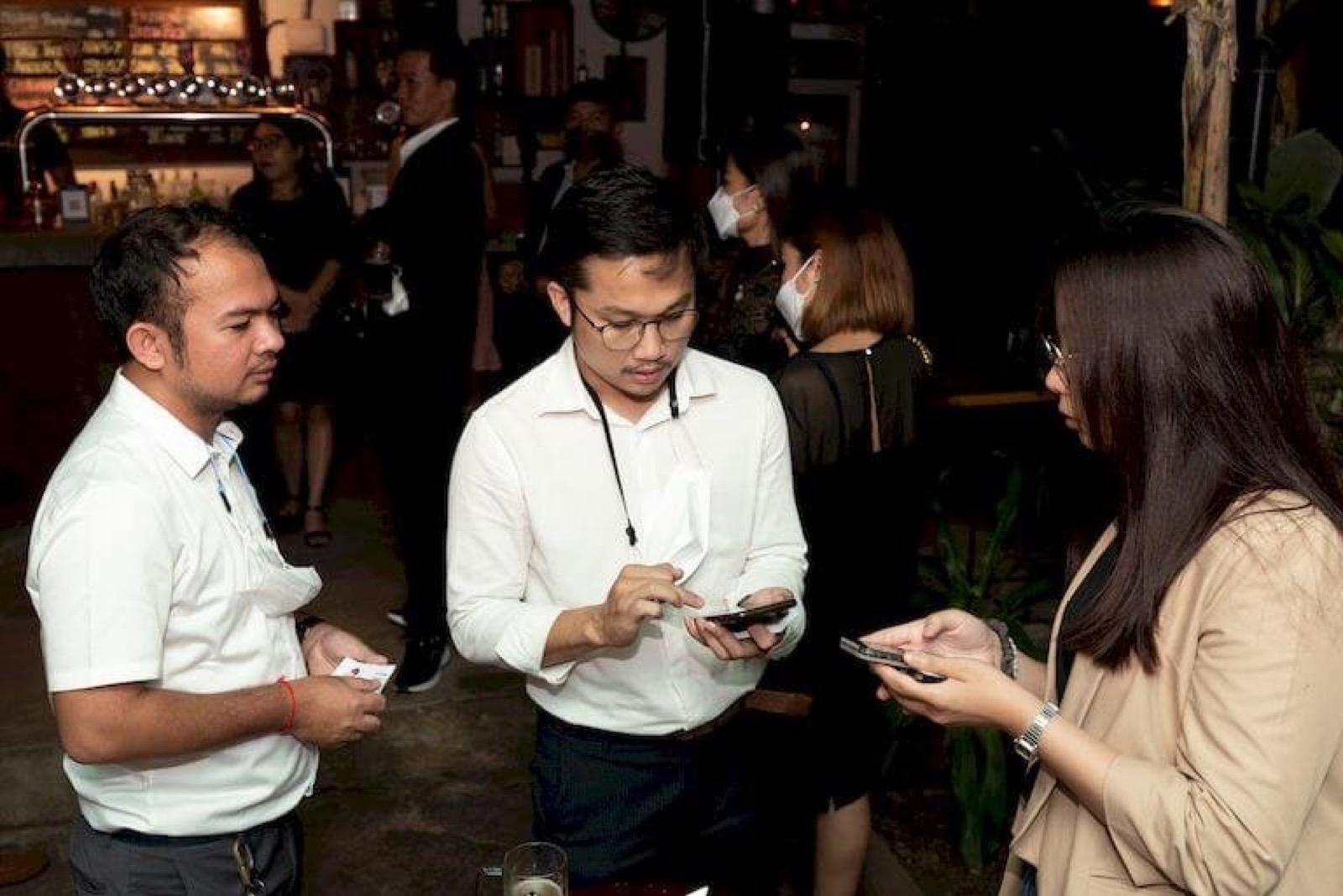 Members talking at an AmCham Cambodia networking evening