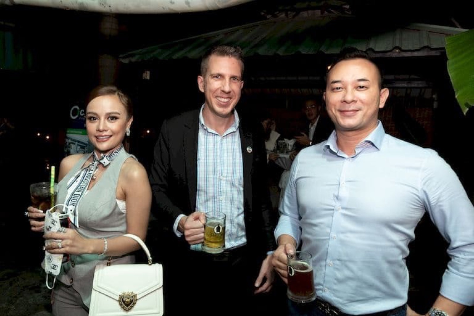 Three members at an AmCham Cambodia networking evening